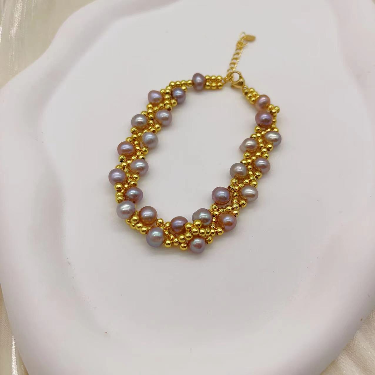 (B043) Freshwater pearl strand interwoven with thread bracelet