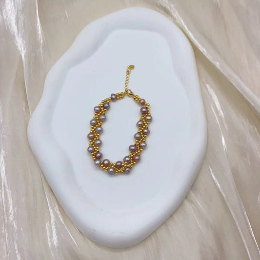 (B043) Freshwater pearl strand interwoven with thread bracelet