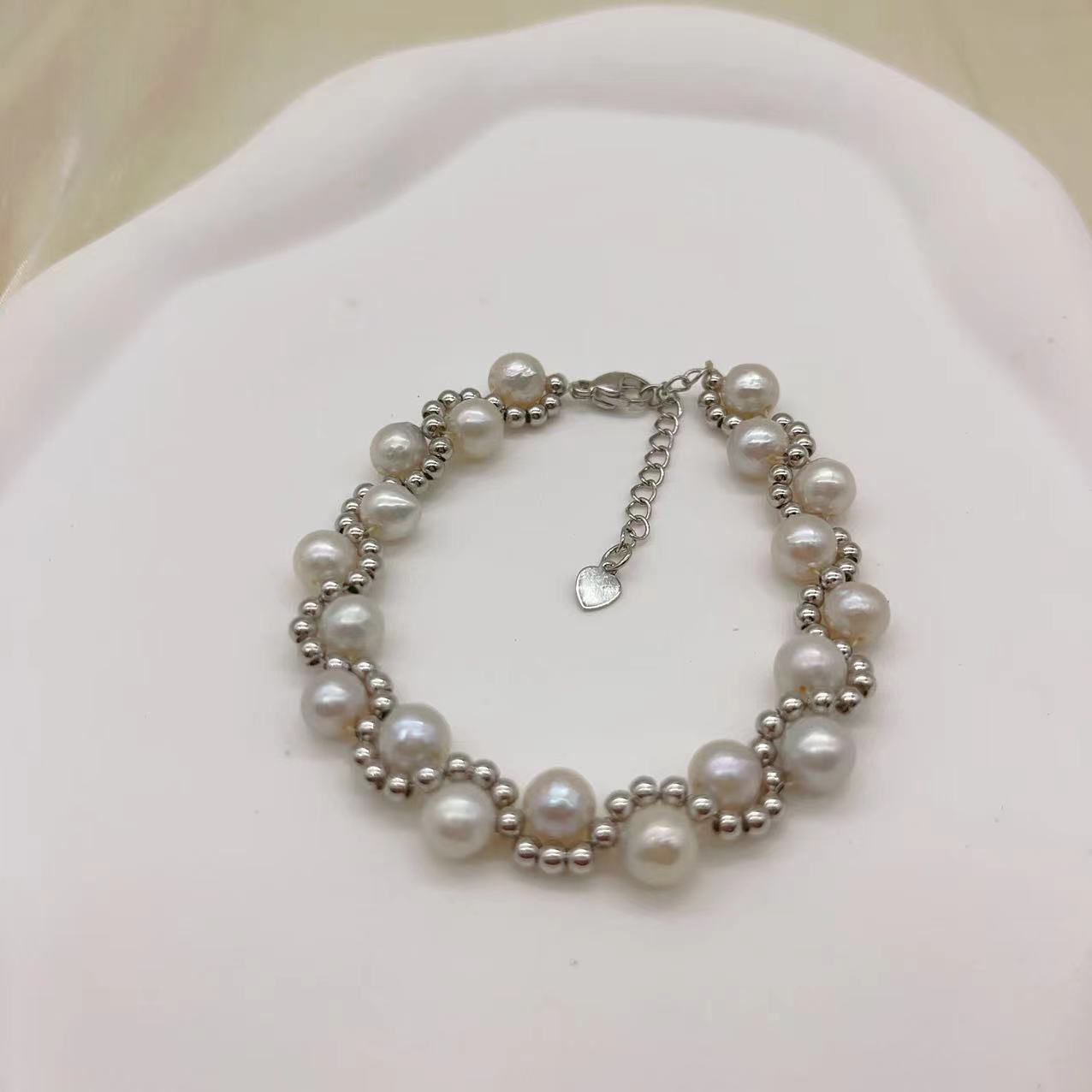 (B043) Freshwater pearl strand interwoven with thread bracelet
