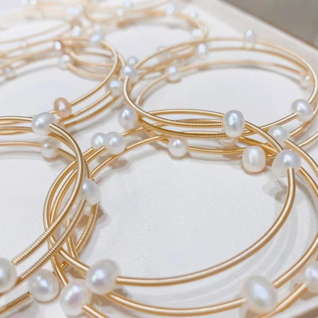 Woven pearl Bangle