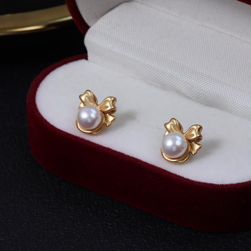 (E037) Bow pearl stud earrings