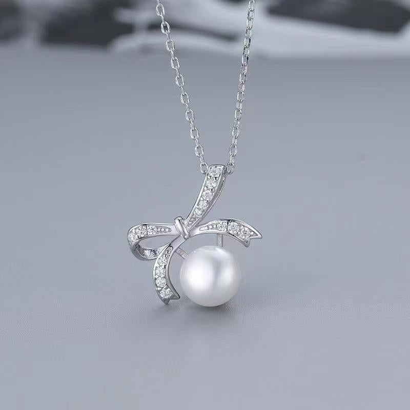 (P36) Bow-tie pearl pendant s925