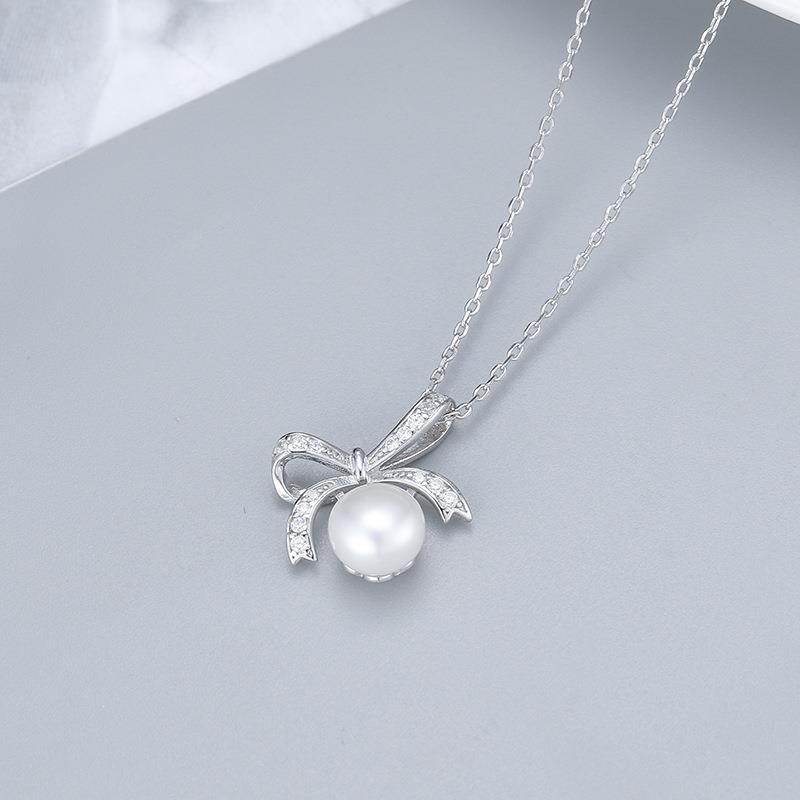 (P36) Bow-tie pearl pendant s925