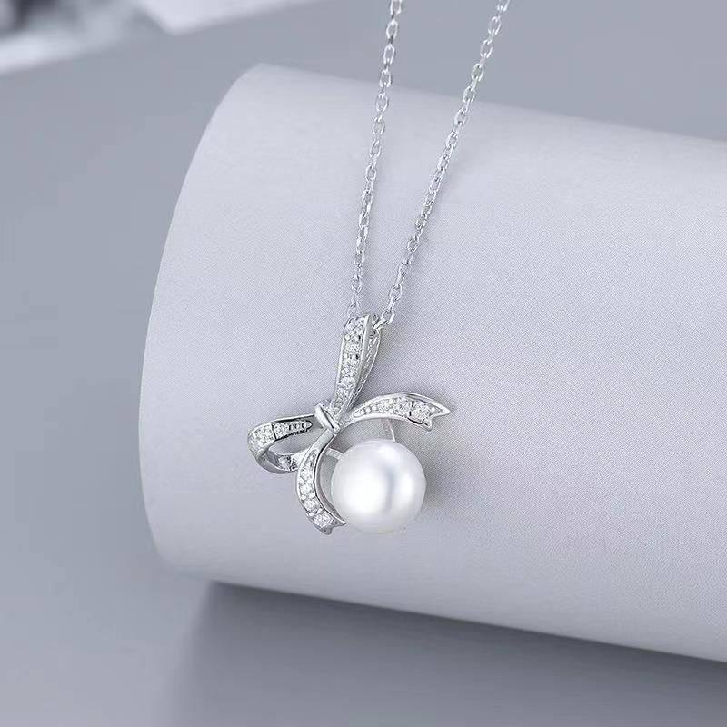 (P36) Bow-tie pearl pendant s925
