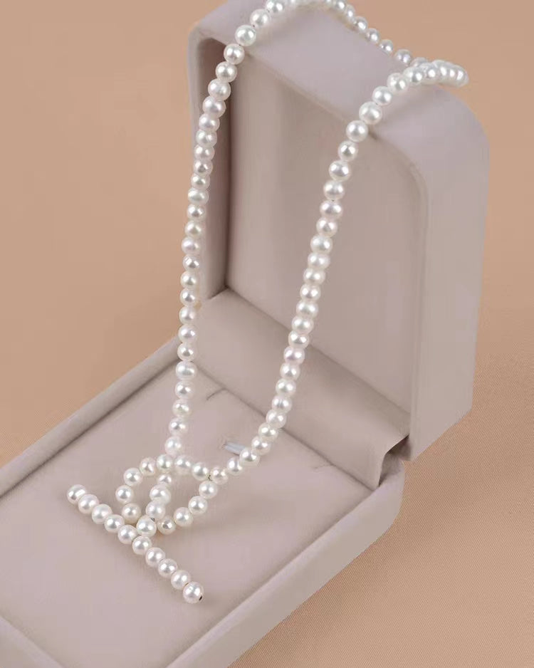 Perlenkette 90 USD (29 N)