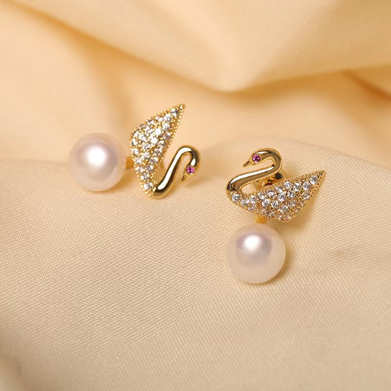 (E011)  Swan pearl earring