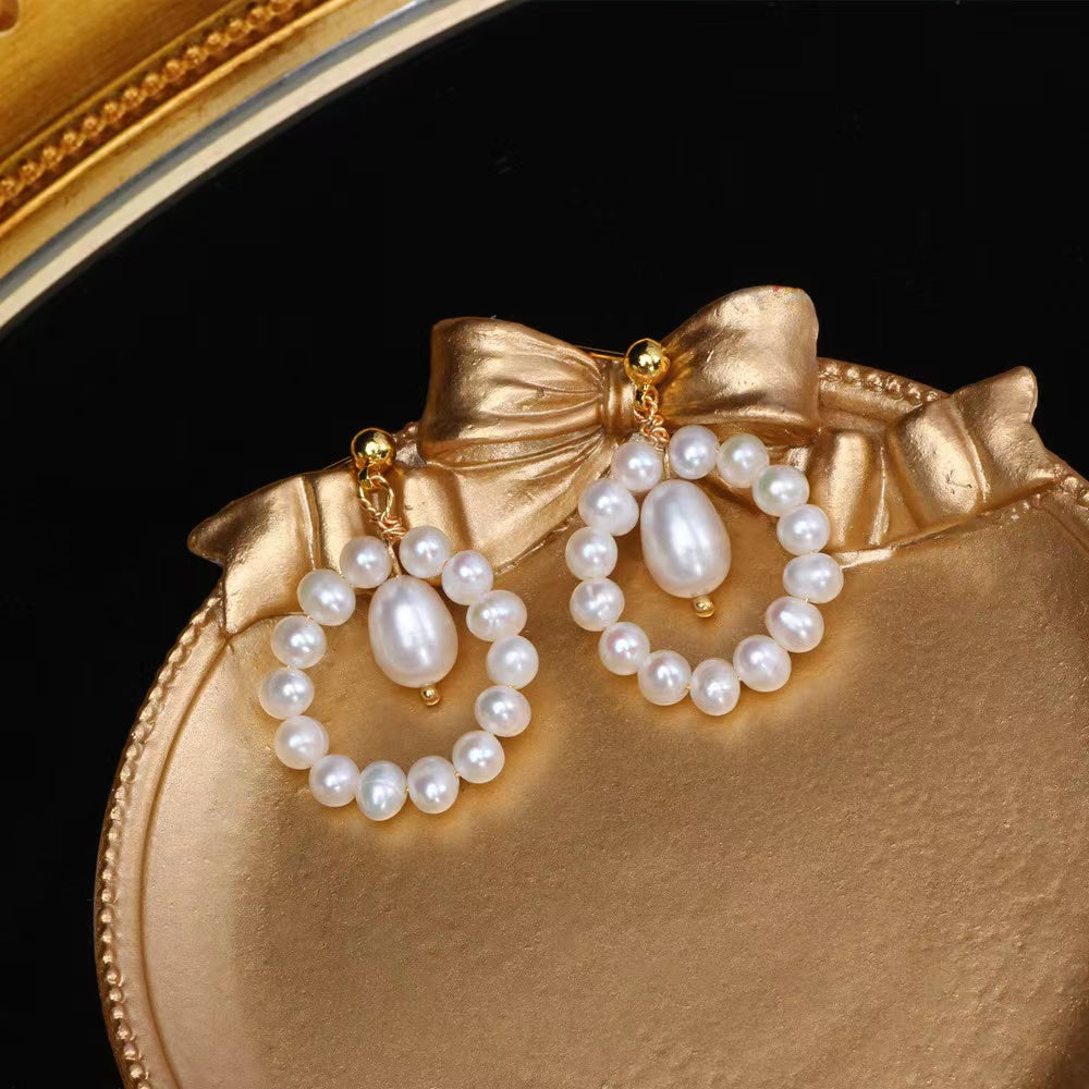 (E008)  White pearl earring USD29