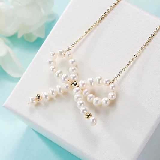 (P022) Bow style pearl pendant S925