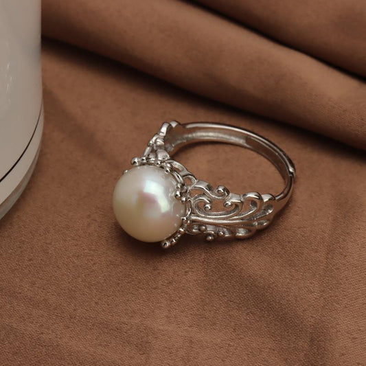 Carved sterling silver pearl ring