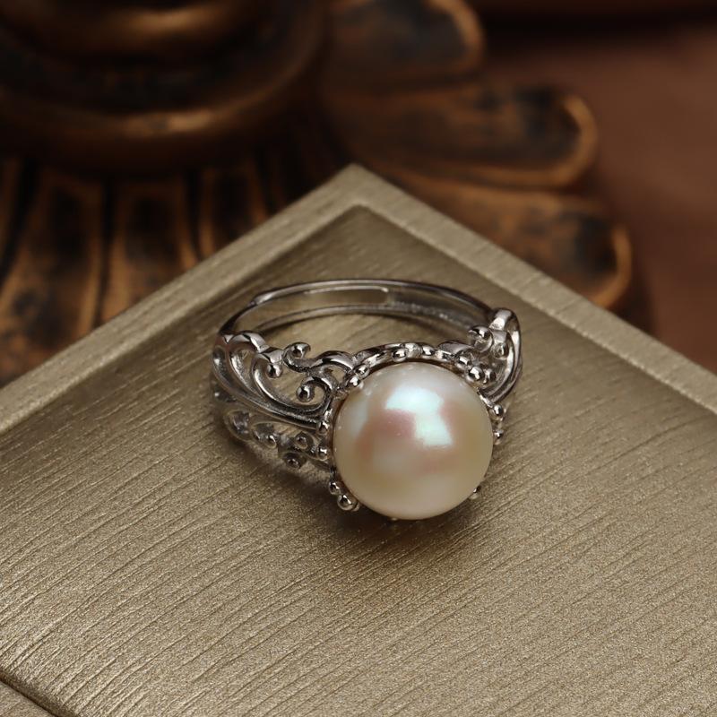 Carved sterling silver pearl ring