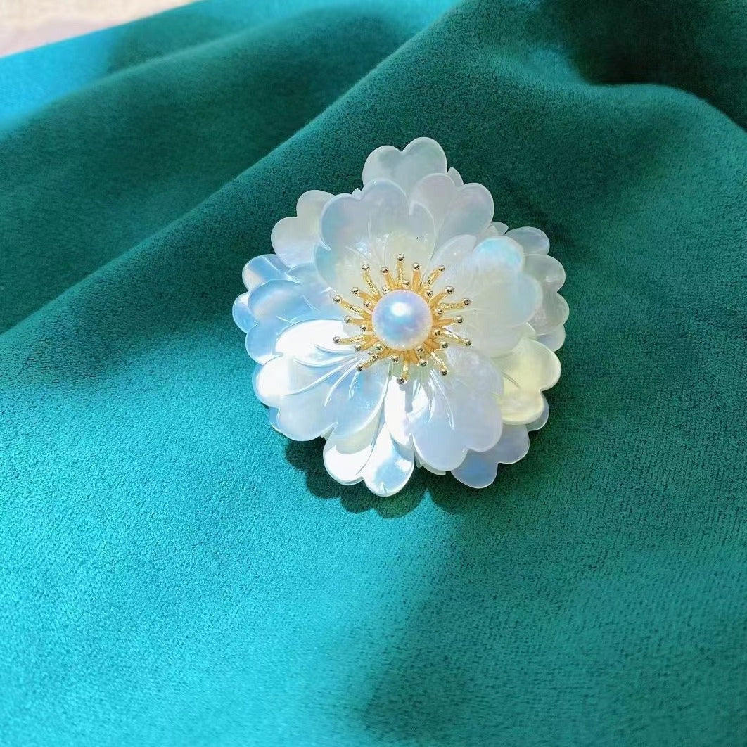 Broche perle d'eau douce 60 USD