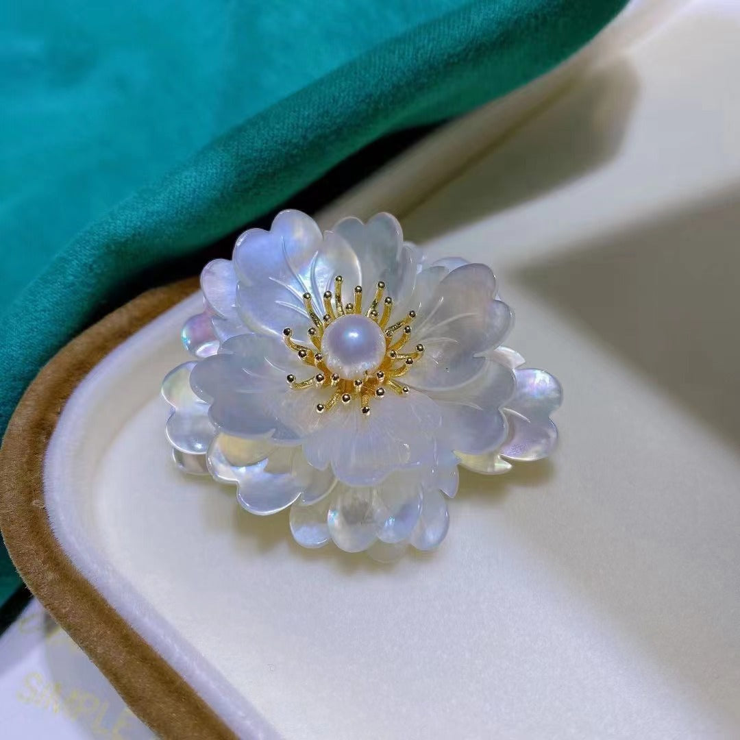 Broche perle d'eau douce 60 USD