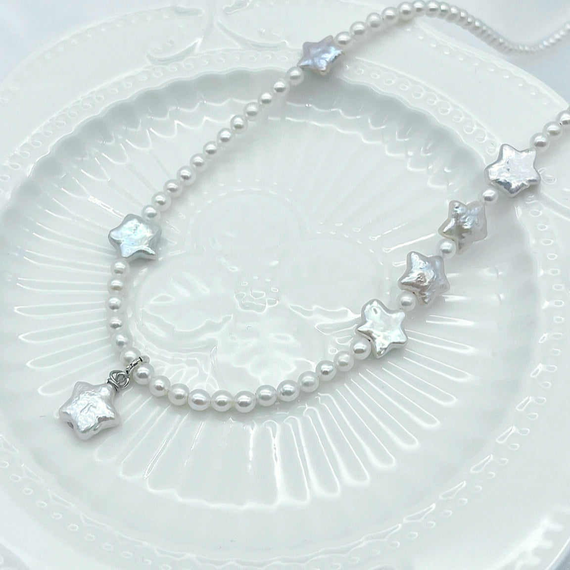 Collier étoile blanche et perles akoya