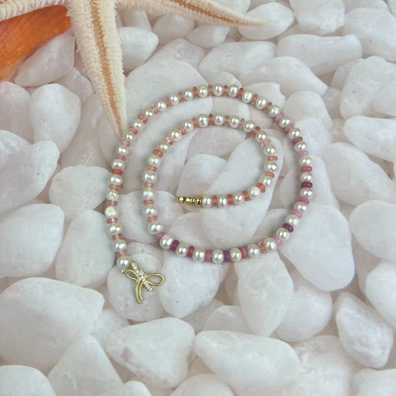 Pearl and crystal long necklace