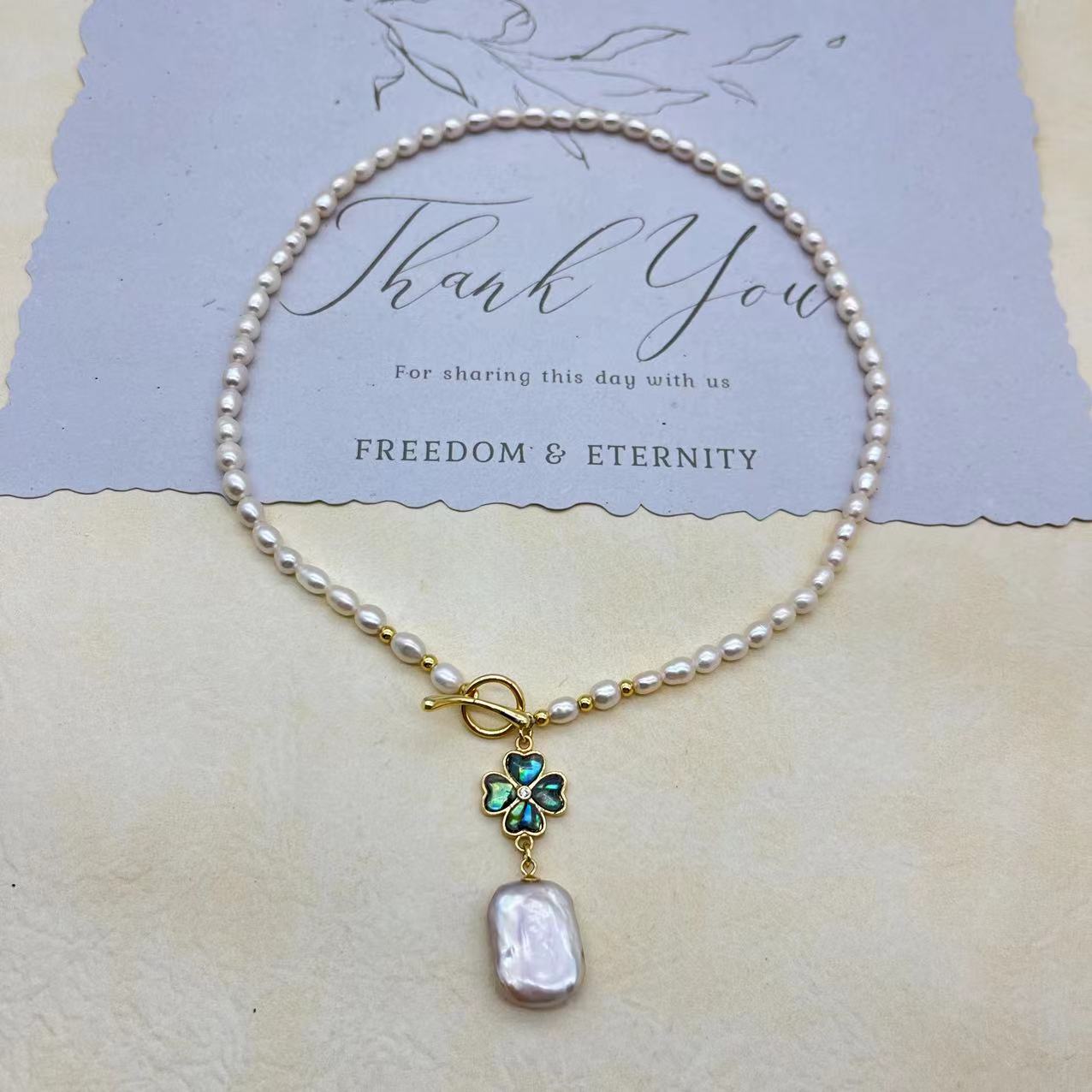 Freshwater pearl abalone shell pendant necklace