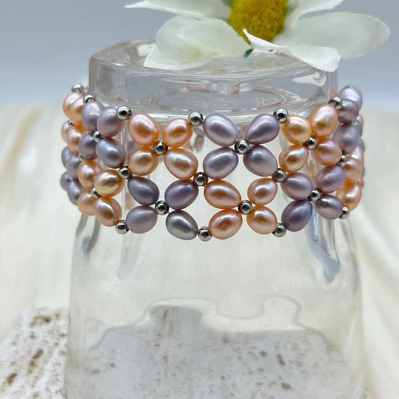 Purple and champagne pearl woven bracelet