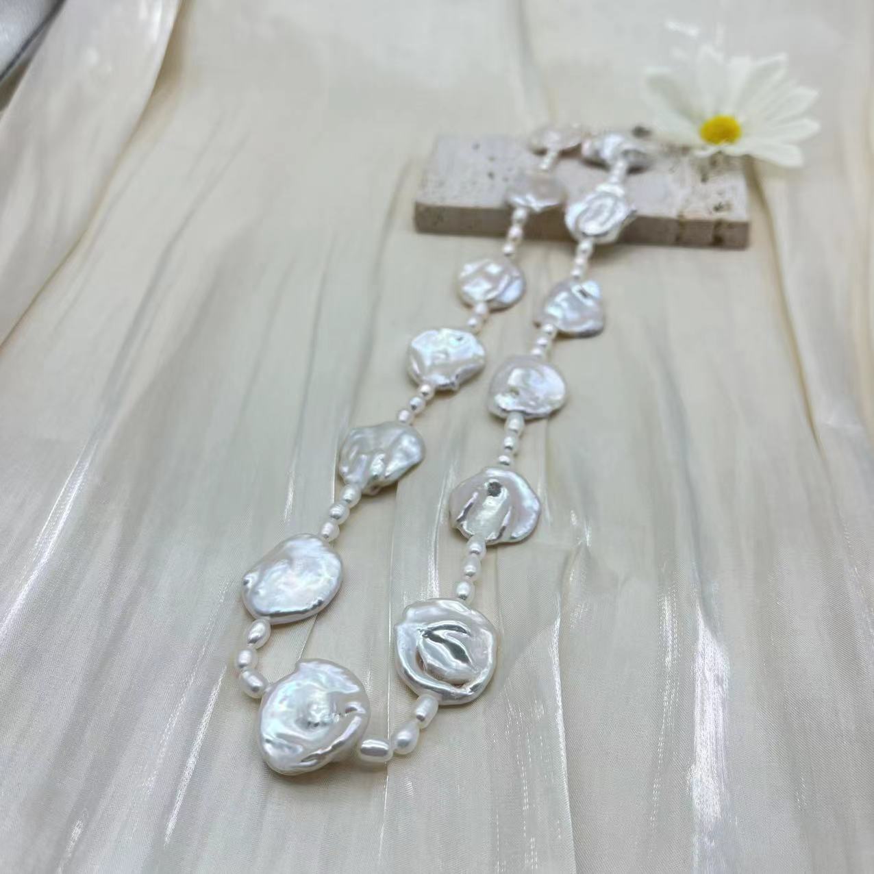 Petaled Baroque pearl and rice pearl long necklace