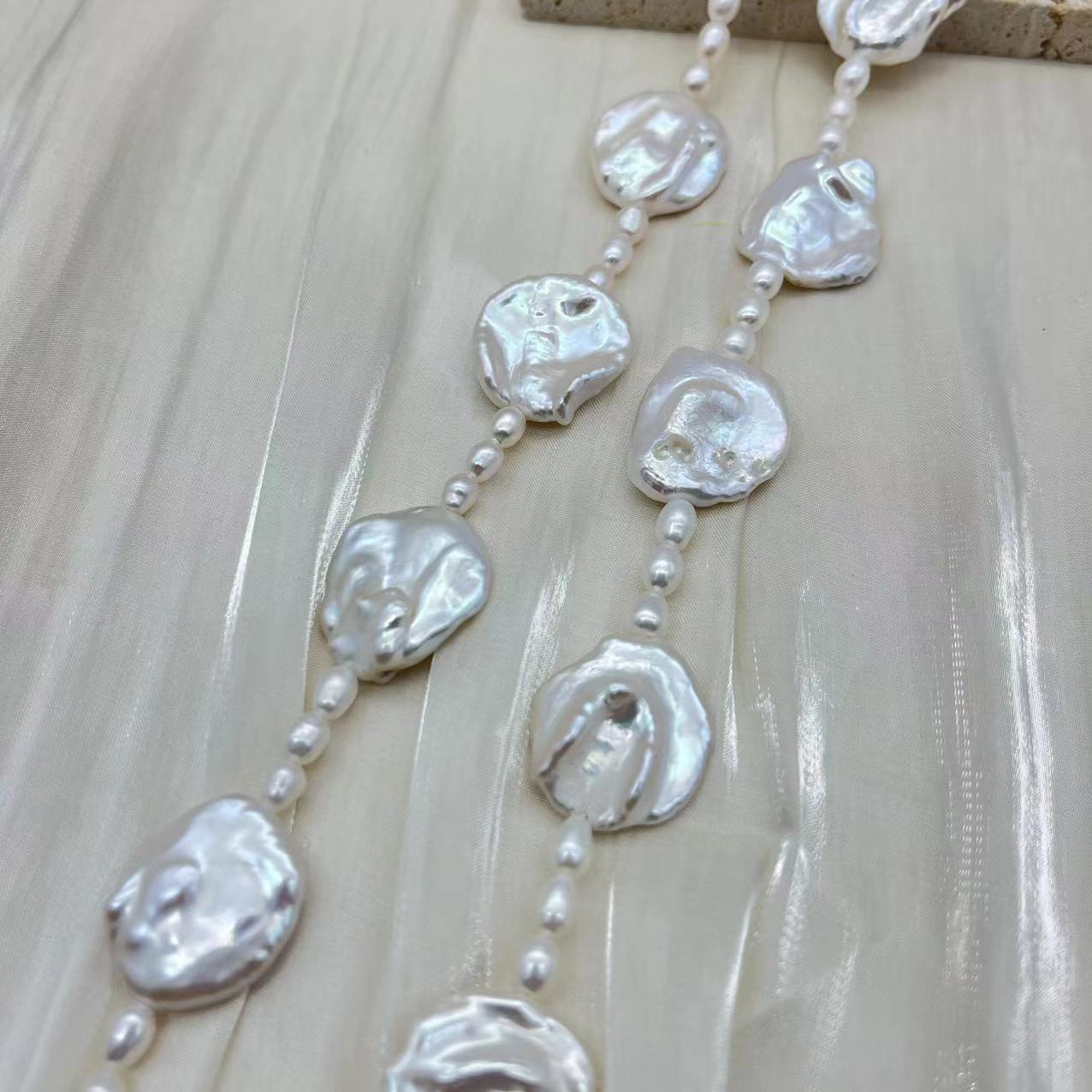 Petaled Baroque pearl and rice pearl long necklace