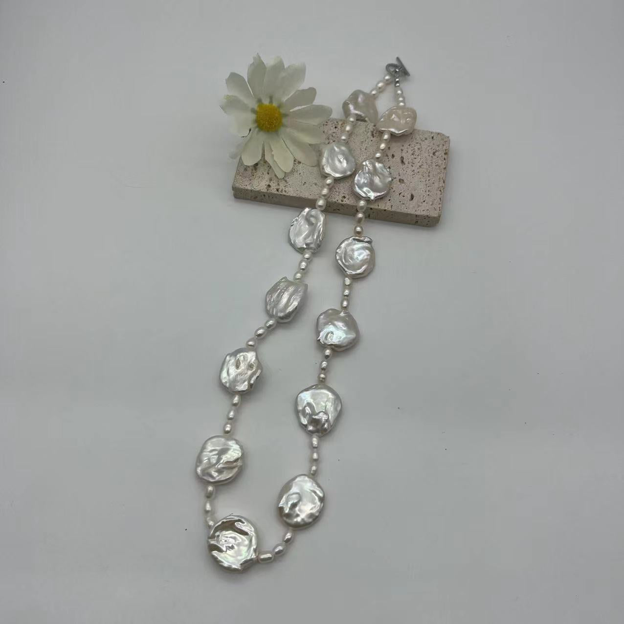 Petaled Baroque pearl and rice pearl long necklace