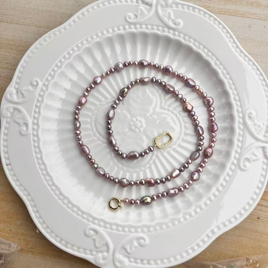 Purple pearl necklace for Donna