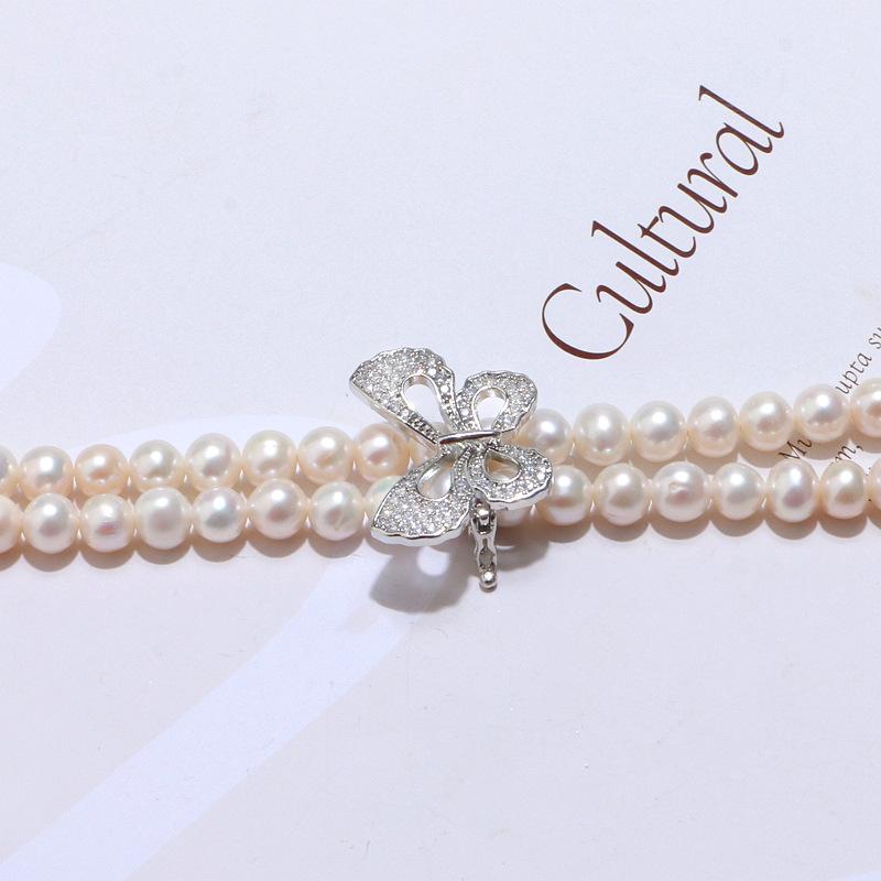 Butterfly pearl bracelet