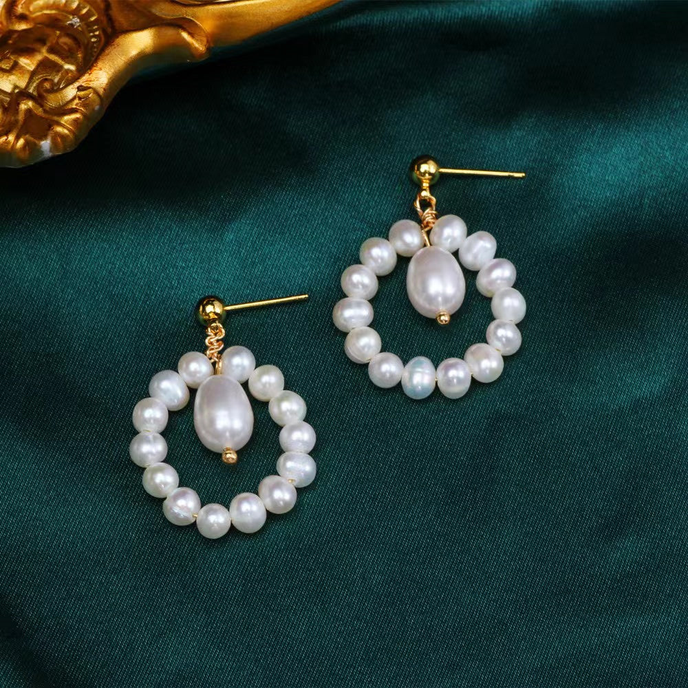 Boucle d'oreille perle blanche 29 USD (E43)