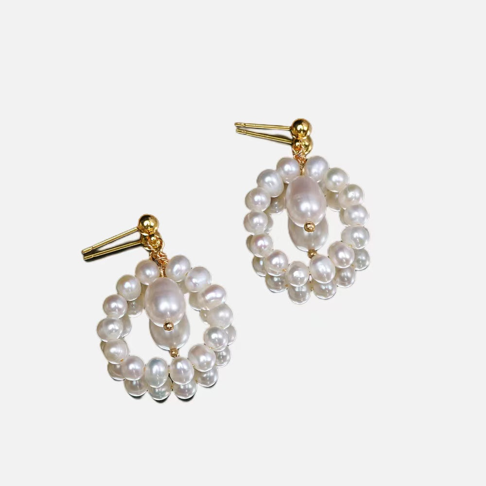 Boucle d'oreille perle blanche 29 USD (E43)