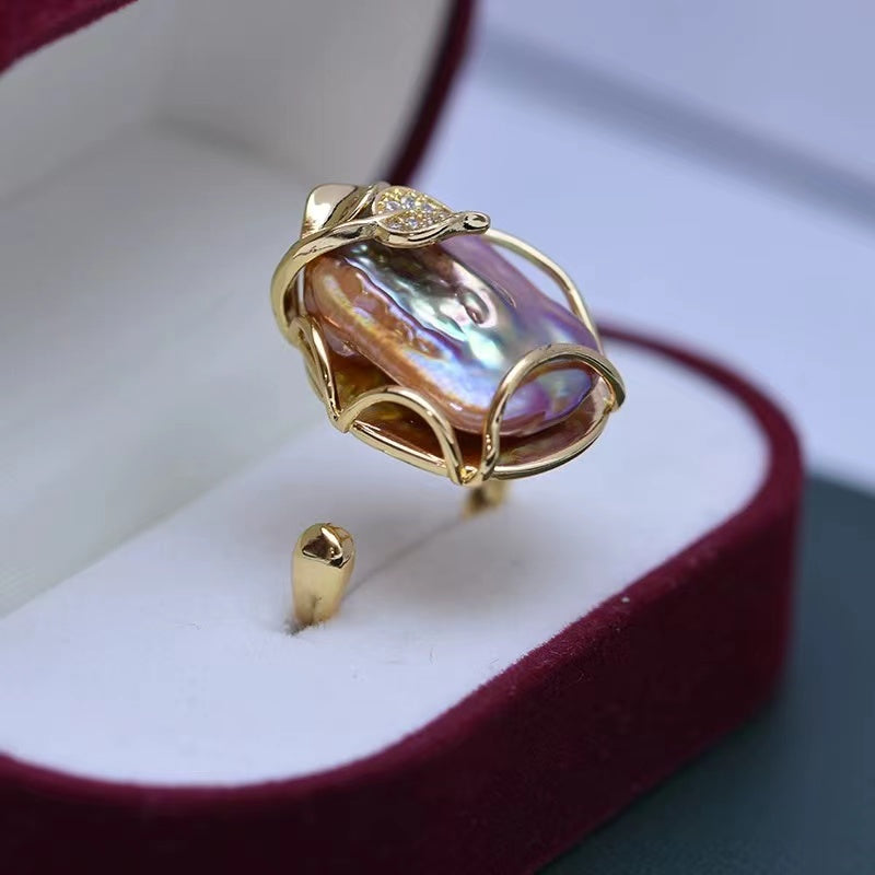 Bague perle baroque rectangulaire 25 USD (R50)