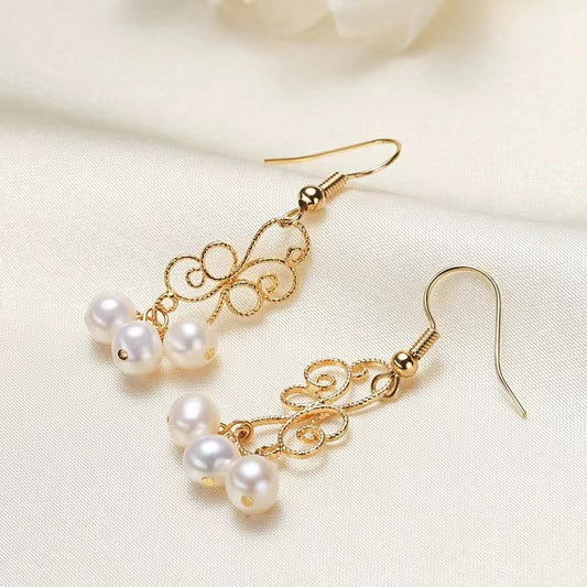 Boucles d'oreilles en perles 20 USD (E27)