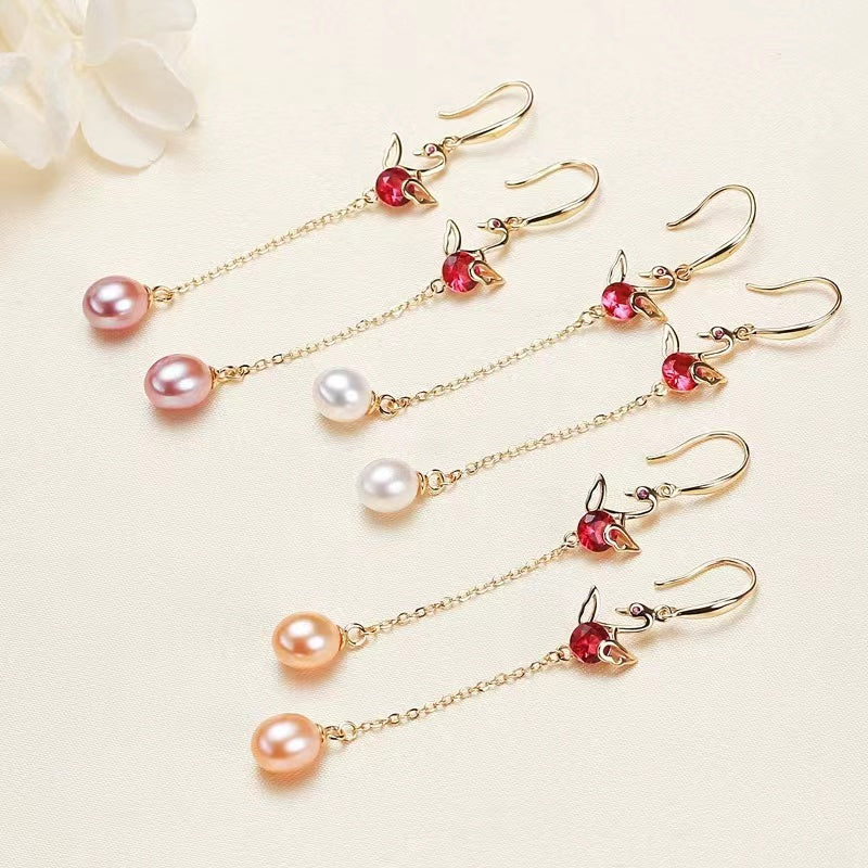 Boucles d'oreilles perles 30 USD (E30)