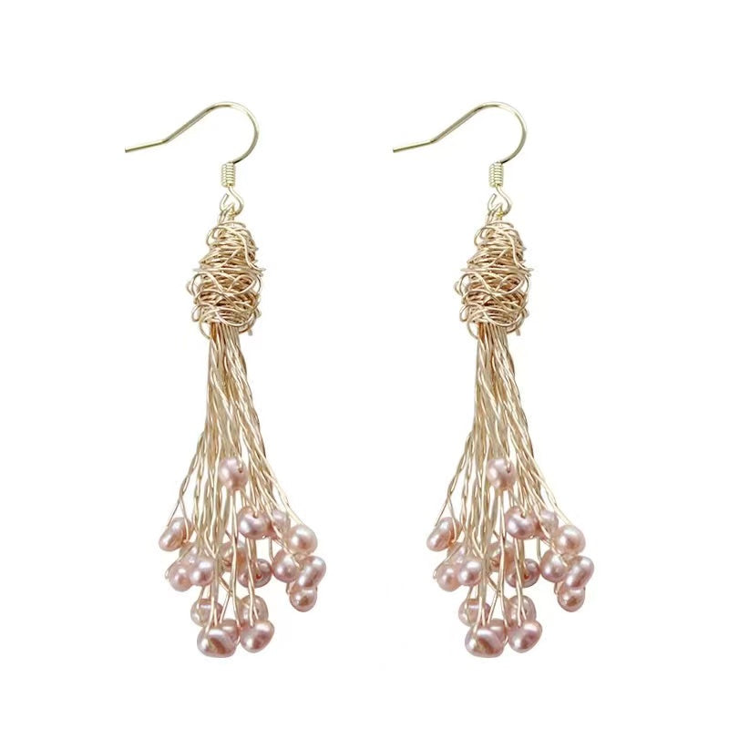 Boucles d'oreilles en perles 30 USD (E34)