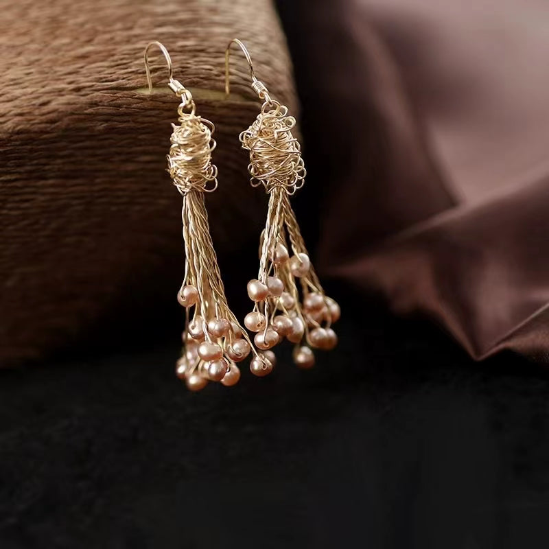 Boucles d'oreilles en perles 30 USD (E34)