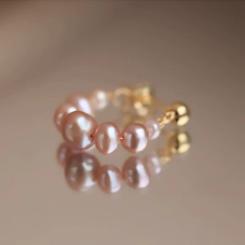 Boucle d'oreille perle 35 USD (E35)