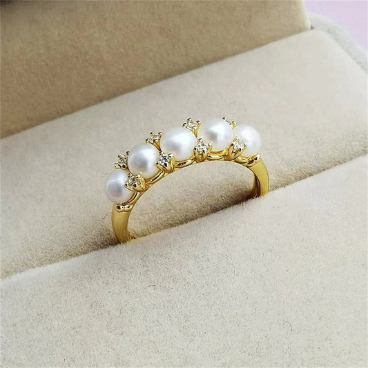 Bague cinq perles R38